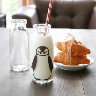 Smiling penguin and panda bottle milk bottle